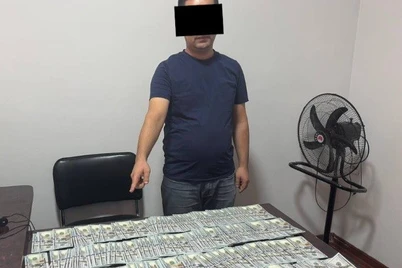 Фарғонада солиқ катта инспектори 30 минг доллар билан ушланди