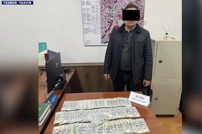 Хоразм вилояти ИИБ тезкор вакили 30 минг доллар билан ушланди