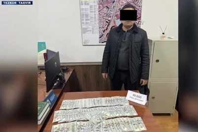 Хоразм вилояти ИИБ тезкор вакили 30 минг доллар билан ушланди