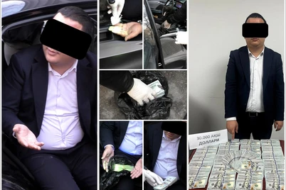 Нуфузли банкнинг мансабдор ходими 30 минг доллар билан қўлга олинди