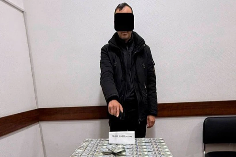 Наманганда тадбиркордан 100 минг доллардан ошиқ пул талаб қилган солиқчи ушланди