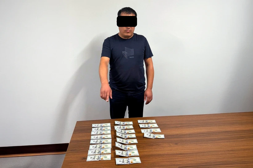 Фарғонада МИБ мансабдори пора билан қўлга олинди