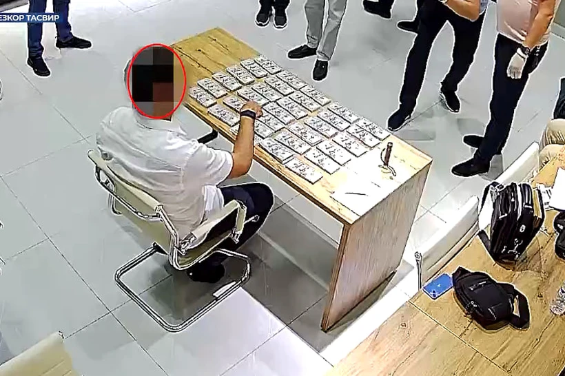DXX 300 ming dollar pora olayotgan xodimni qoʻlga tushirdi