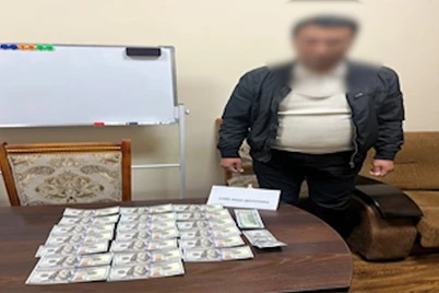 Olmaliqda mansabdor katta pora bilan ushlandi